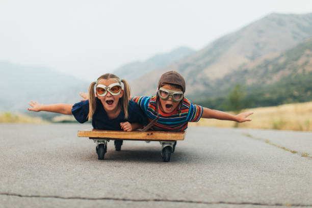 istock Young Kids Flying on a Press Cart 1043320526