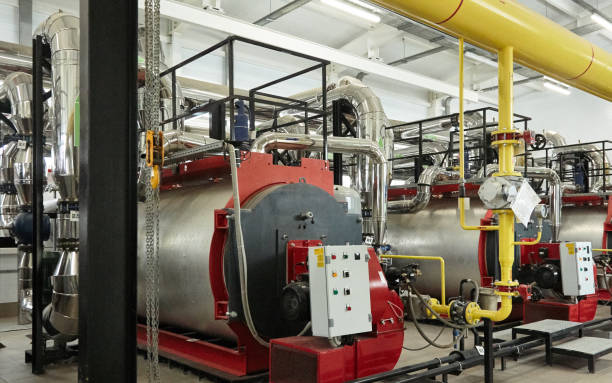istock Modern new gas heating coppers work in a boiler room. 1043320588
