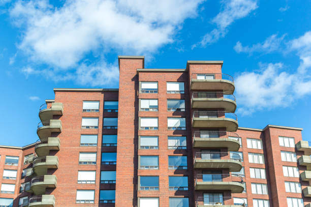 istock Modern condo buildings with huge windows in Montreal 1043323010