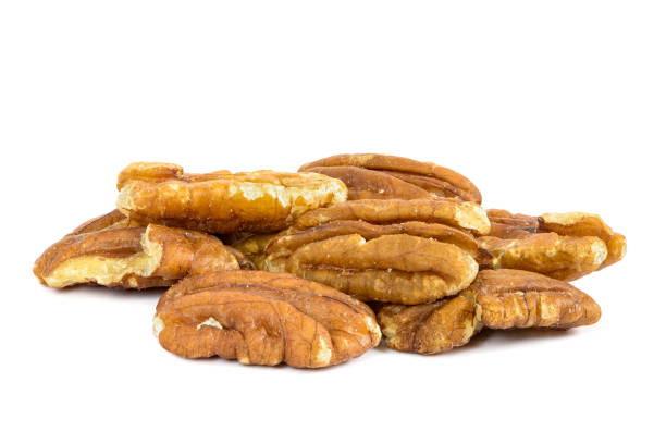 istock Heap of pecan nuts on white background 1043326578
