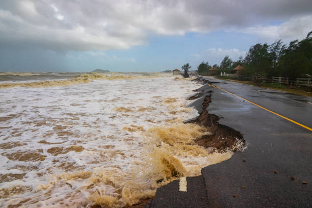 istock Road damage caused by sea waves erode 1043329620