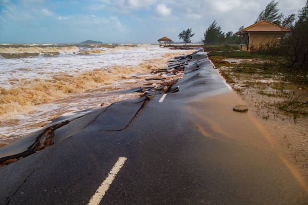 istock Road damage caused by sea waves erode 1043329768