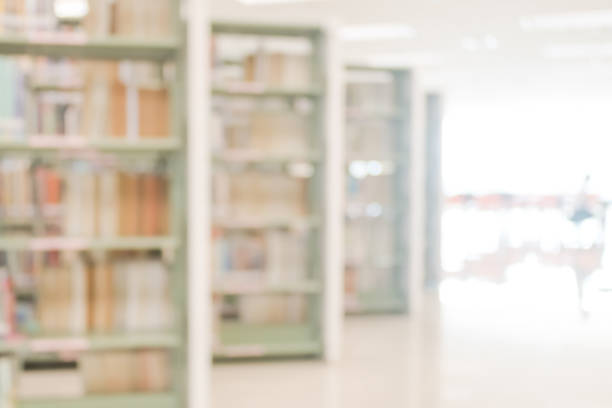 istock Blur school library or study room with book shelves for education background 1043338266
