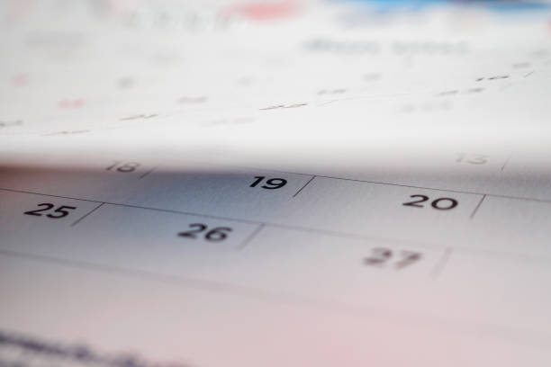 istock calendar page flipping sheet close up background 1043338370