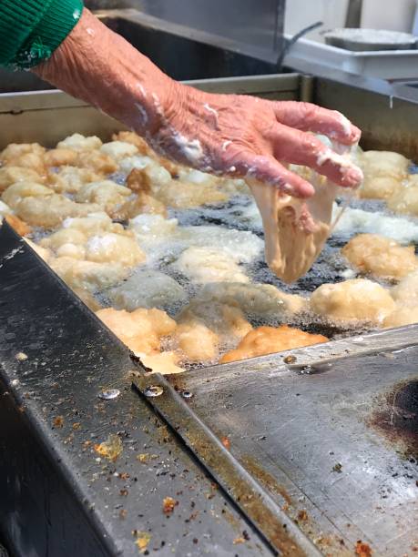 istock Making zeppoles at the feast 1043338490