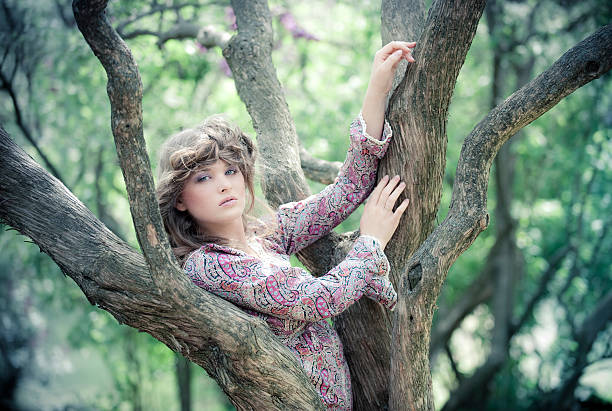 Girl near tree stock photo