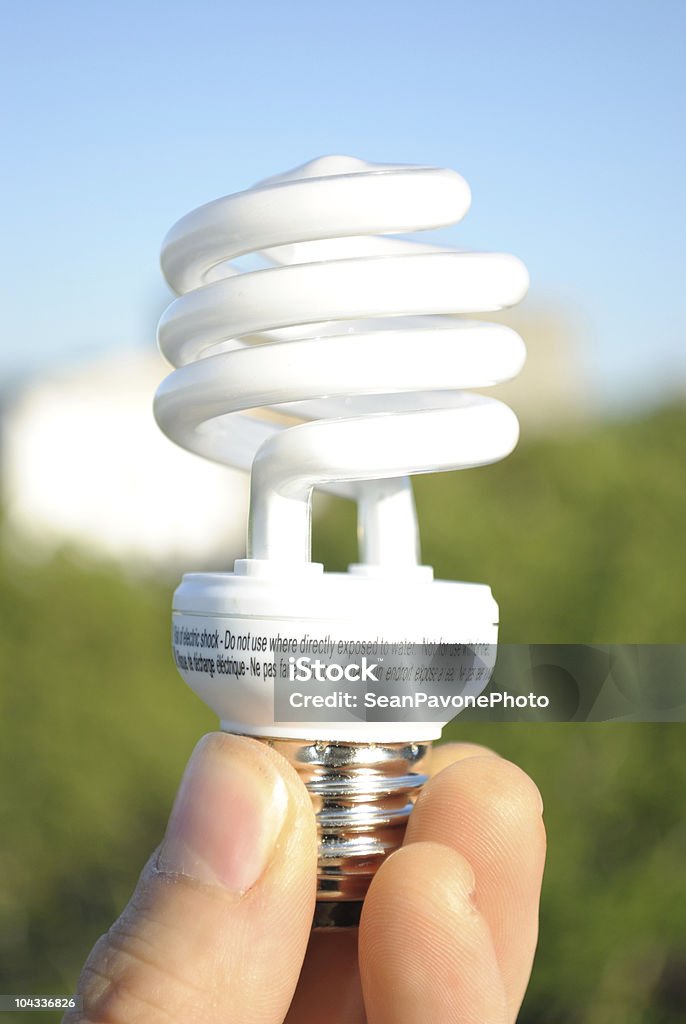 Lâmpada fluorescente de energia eficiente - Foto de stock de Conservacionista royalty-free
