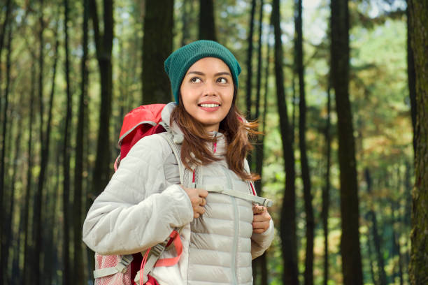 istock Young asian traveler with backpack 1043376094