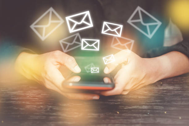 istock Woman hand using smartphone to send and recieve email. Business communication  technology concept. 1043376122