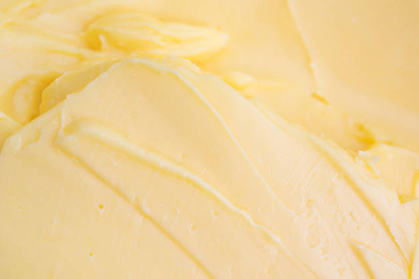 istock Cheese butter or margarine baking ingredient background 1043378424