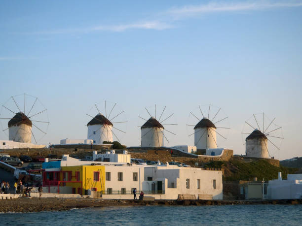 istock windmills on the coast of mykonos 1043378544