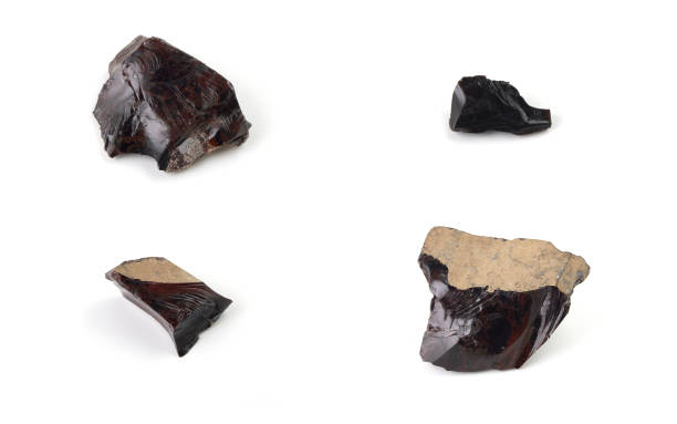 istock Rough obsidian stones isolated on white 1043378576