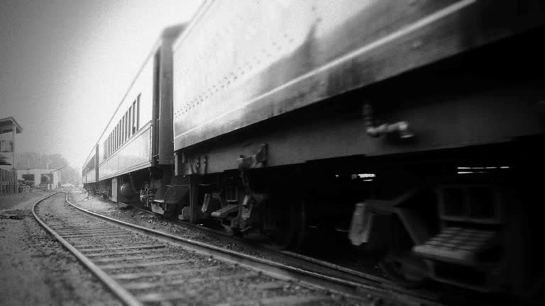 Steam Engine Train Leaves Station - BW