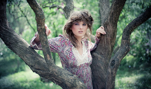 Girl near tree stock photo