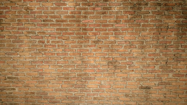istock old orange vintage brick wall 1043408250