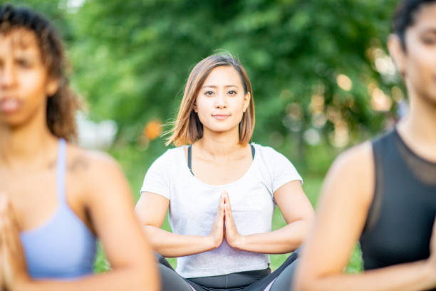 istock Happy Woman Meditating 1043415384