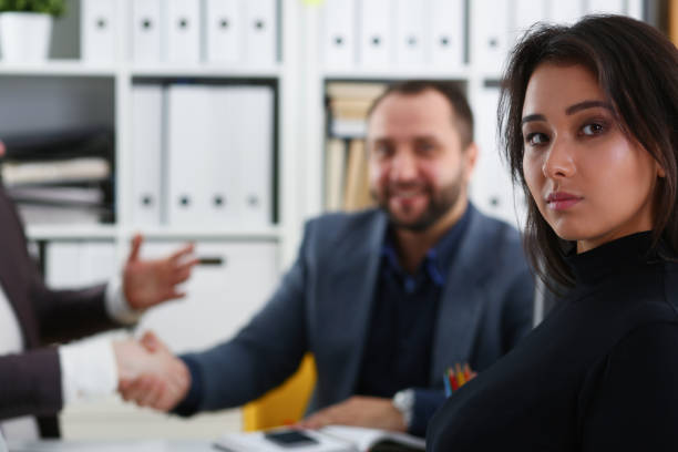 istock young happy businessmen have meeting in office discuss issues 1043421002