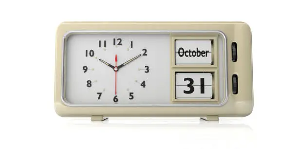 Photo of Halloween 2019 date, October 31st on a retro alarm clock isolated on white background. 3d illustration