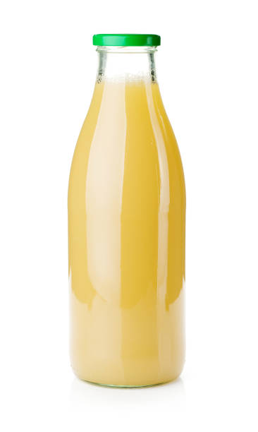 istock Pear juice glass bottle 1043431354