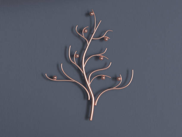 istock abstract metal gold copper tree 3d rendering grey wall 1043435418