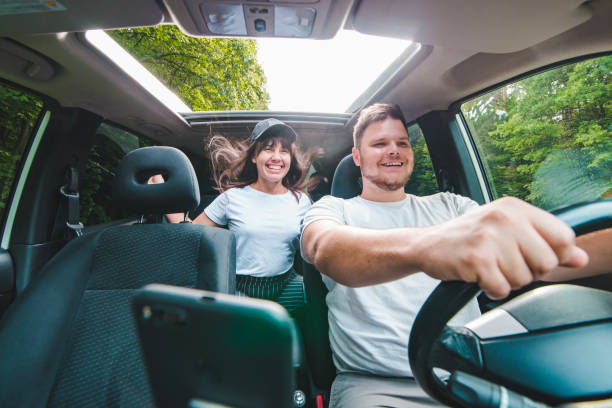 istock couple in car. long road trip 1043443736