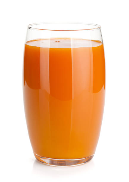 Fresh carrot juice glass Fresh carrot juice glass. Isolated on white background carrot juice stock pictures, royalty-free photos & images