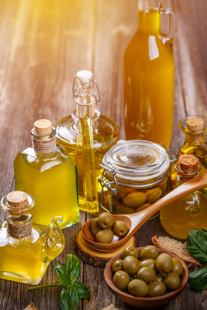 istock Olive oil with green olive 1043449886