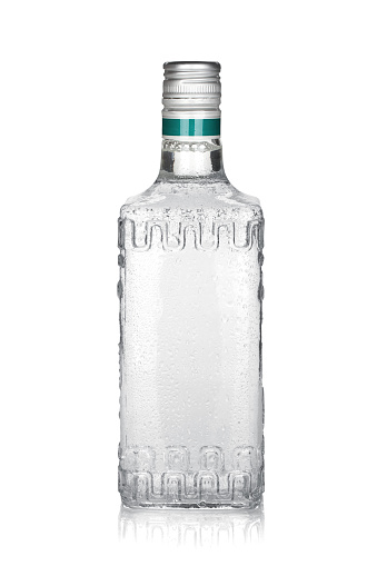 Bottle of silver tequila. Isolated on white background