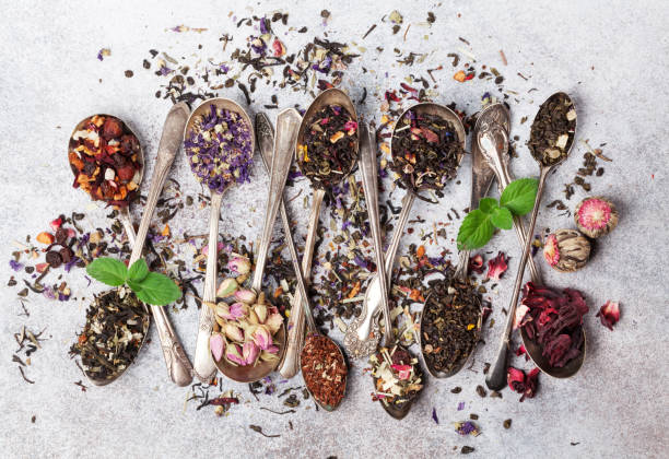 istock Various tea in spoons. Black, green and red tea 1043458354
