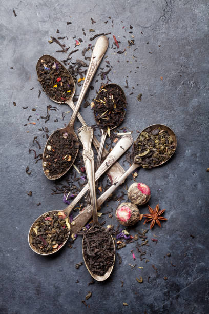 istock Various tea in spoons. Black, green and red tea 1043458392