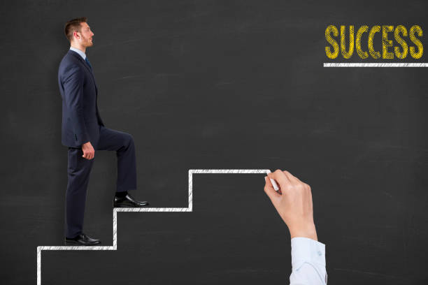 istock Success Concepts on Blackboard Background 1043465602