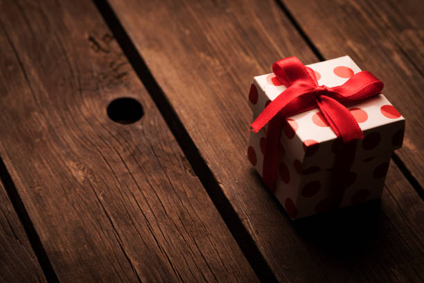 istock Gift Box On The Wood 1043465608