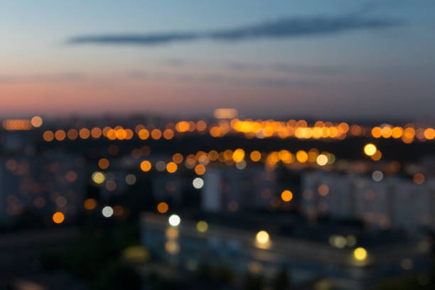 Blurred lights of the evening city at sunset