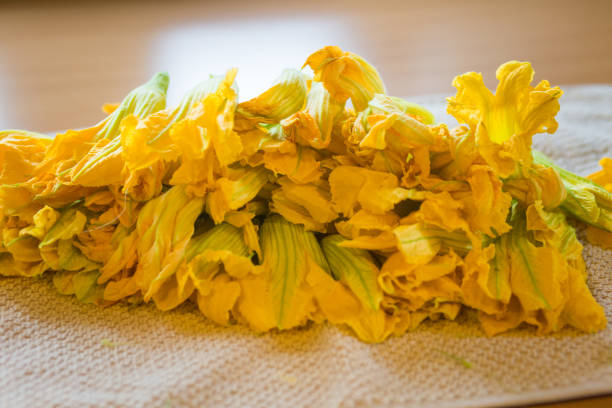 istock Pumpkin flowers prepared for cooking 1043471772