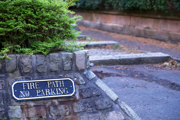 istock Fire path no parking road sign 1043480326