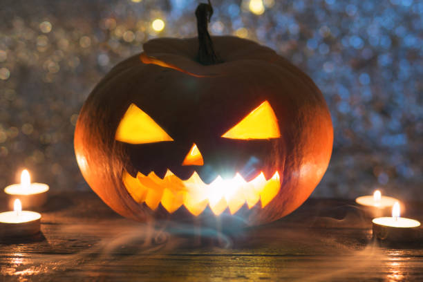 istock Halloween pumpkin with scary face 1043487644