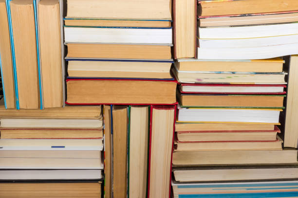 istock Background of the stacked up different books 1043503418