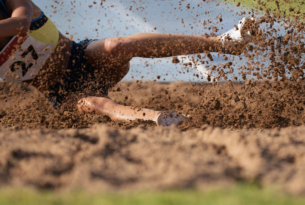 istock Woman athlete jumping long 1043510924