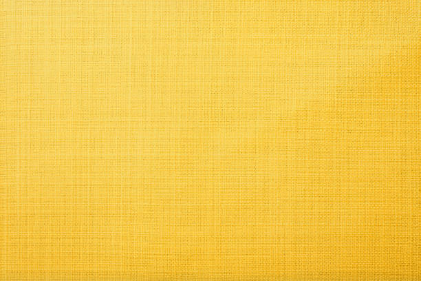 фон желтой ткани - backdrop pattern material colors стоковые фото и изображения