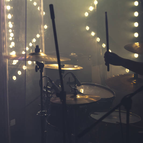 istock Drum set with cymbals and drummer hand 1043517996