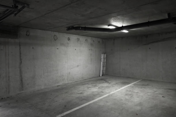 istock Abstract empty parking lot interior photo 1043518634