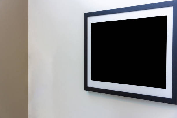 istock Blank photo frame on White wall in art gallery. 1043520556