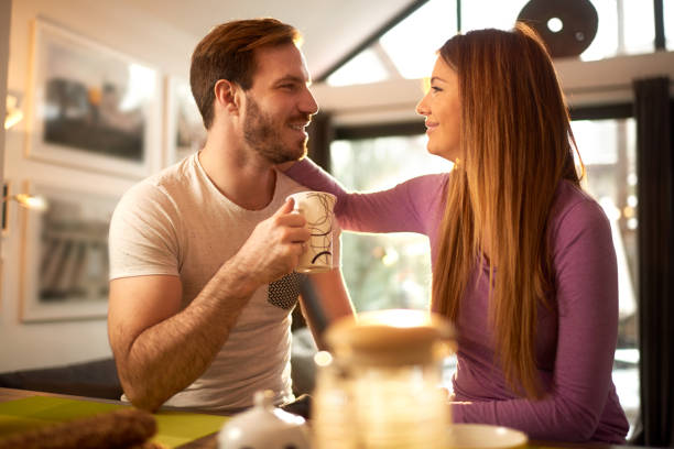 istock Couple at home having coffee and breakfast 1043524738