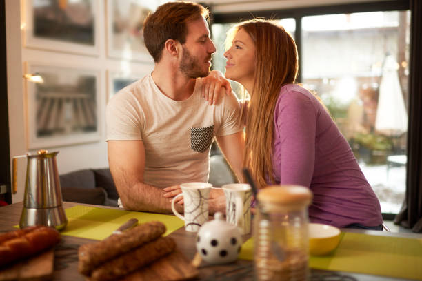 istock Couple at home having coffee and breakfast 1043525252