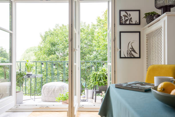 istock View from a room interior on a balcony and trees 1043529540