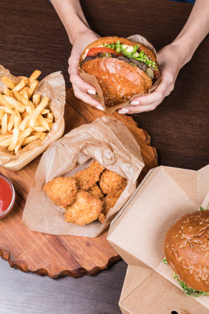istock Burger on a wooden board 1043533068