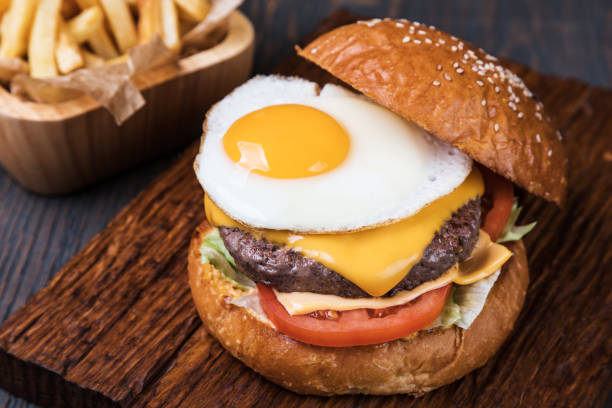 istock Burger on a wooden board 1043534690