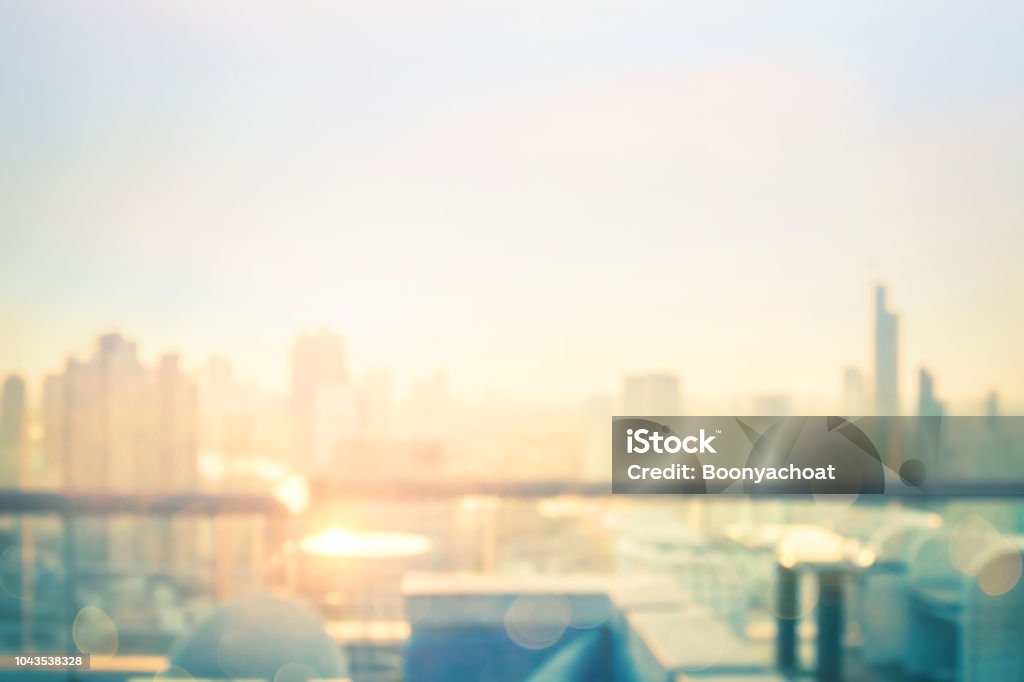 Blurred city background Blurred table restaurant with beautiful city view at twilight scene background City Stock Photo