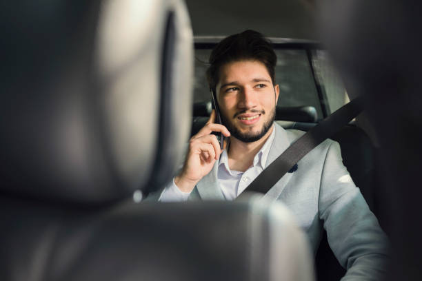 istock Young businessman in a  car 1043538482