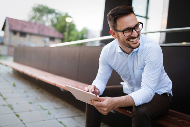istock Businessman having tablet and phone at hand 1043539280